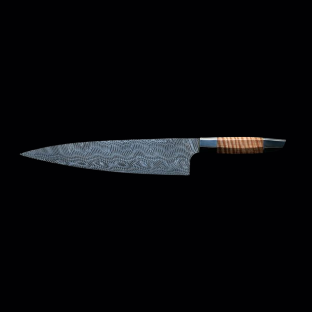 This 405mTm / 10.5” Damasteel high-performance chef knife is part of a collection designed with Bauhaus principles, prioritizing function over form.