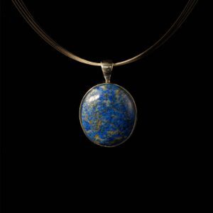 Lapis Form Pendant in rhodium-plated silver with a 24×20mm lapis lazuli cabochon—deep blue with golden pyrite flecks, evoking timeless elegance.
